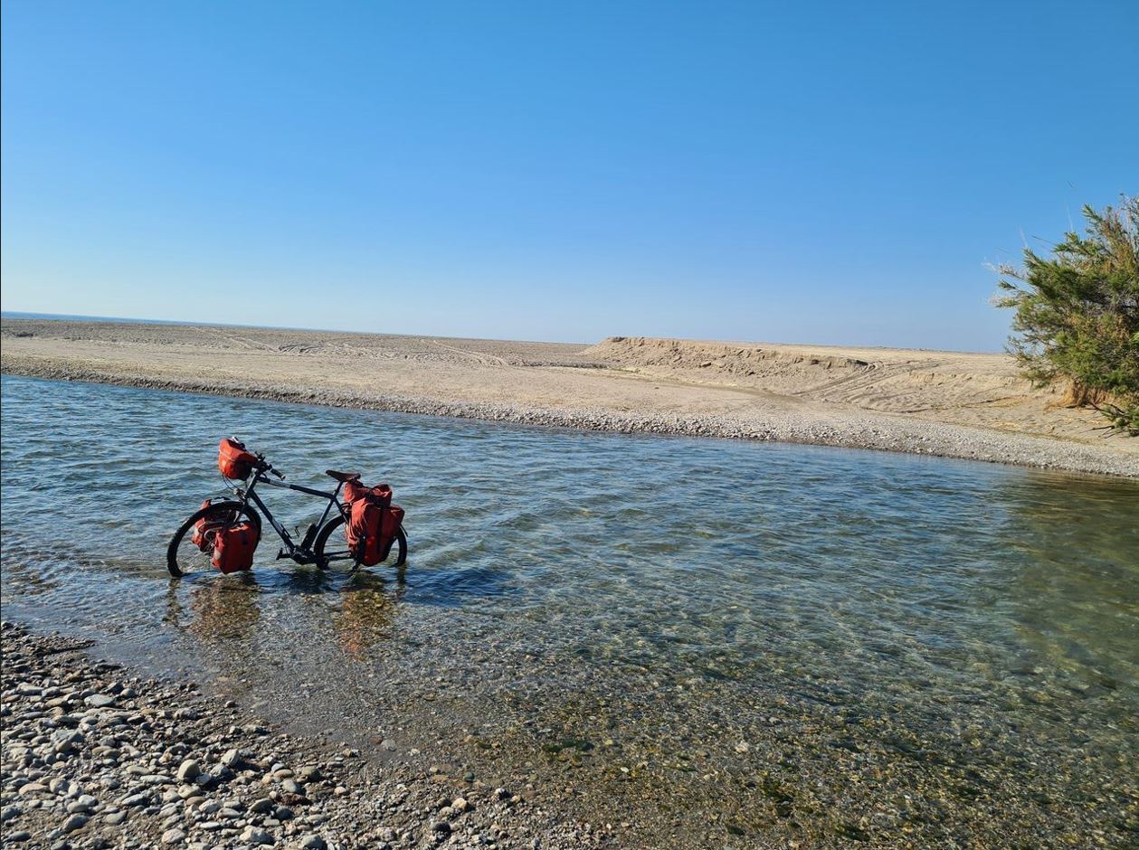 Crossing a creek on the beach