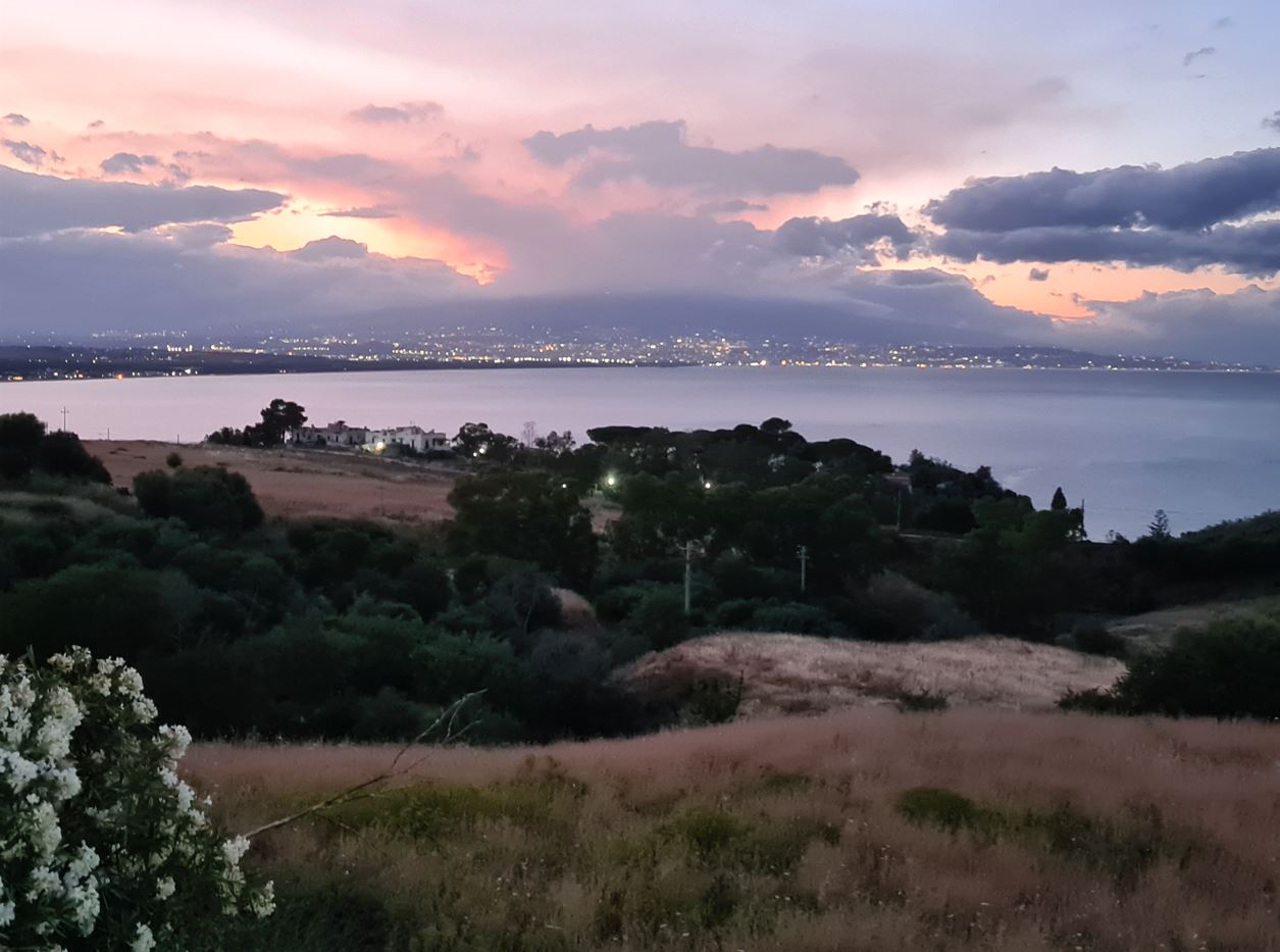 In the background is Etna