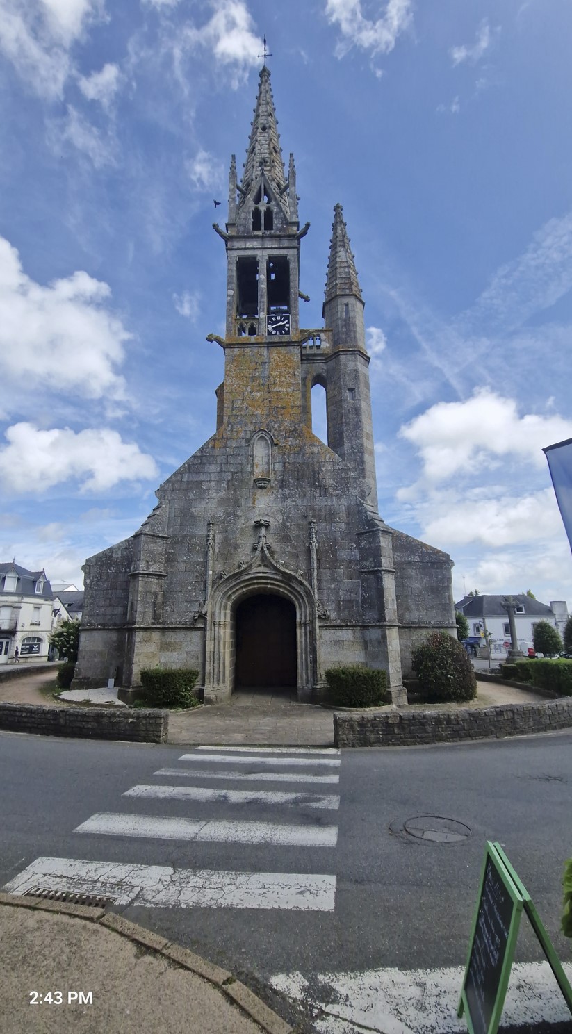 Church of Saint-Peter - the bell tower is flanked by a turret