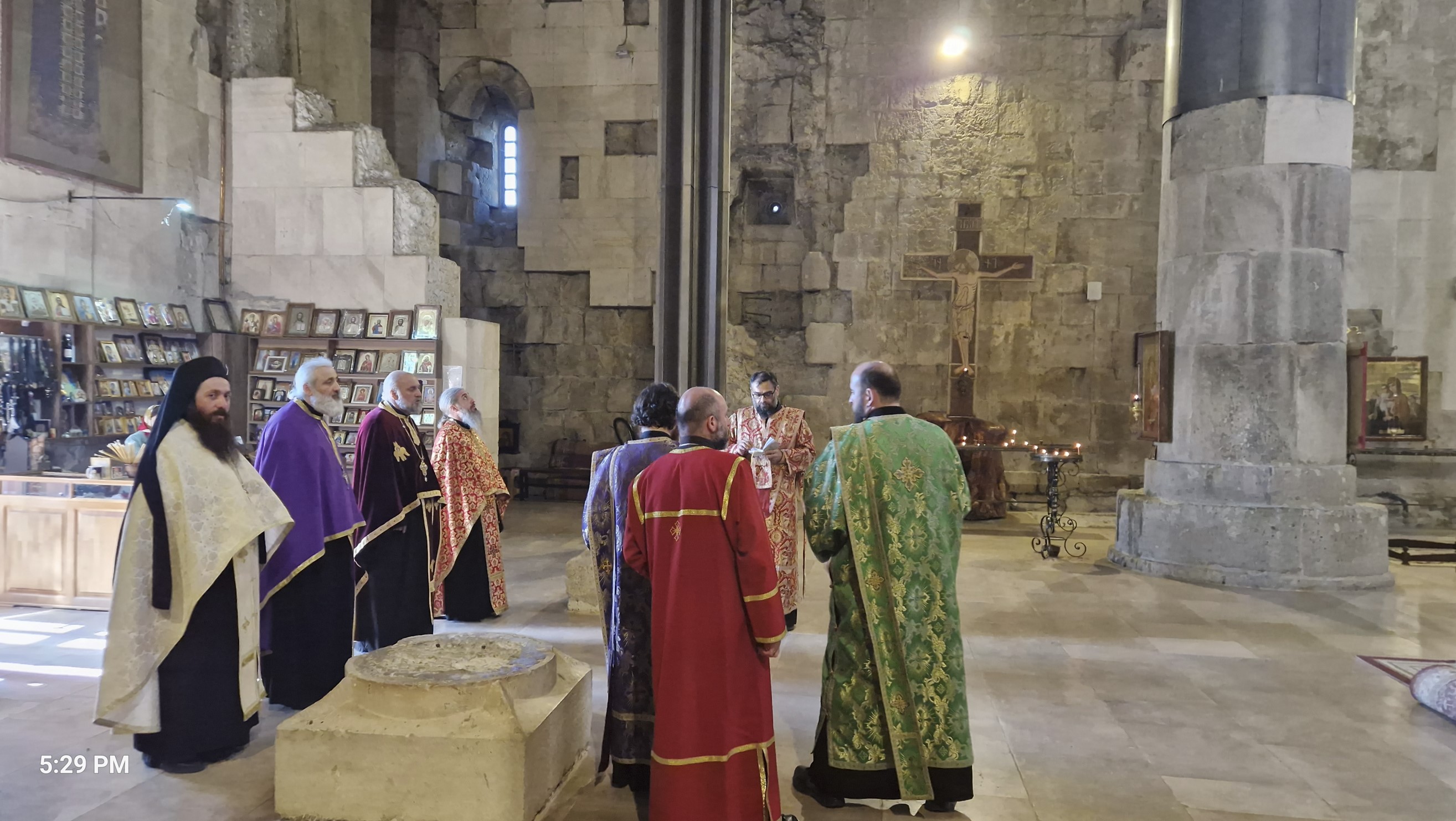 Priests chanting - hardly any worshippers