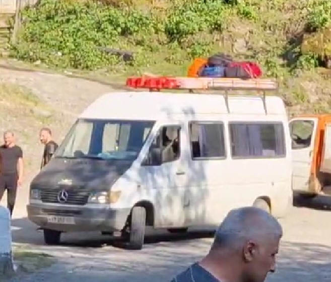 The ancient bus - with my red rucksack on top, amongst others