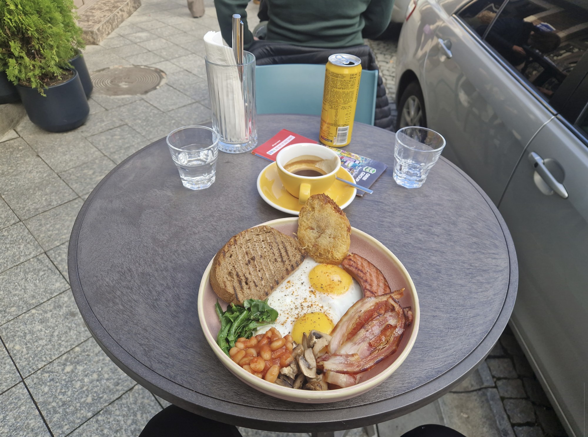 Hungarian guy living in Austria eating English breakfast in Georgia